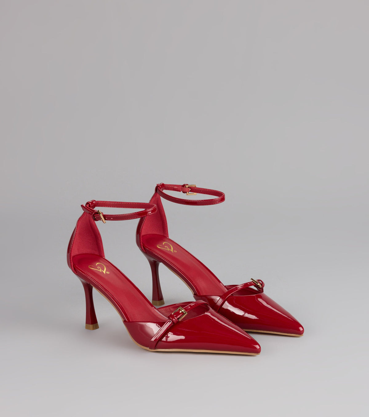 Point Taken Closed Toe Buckle Pumps